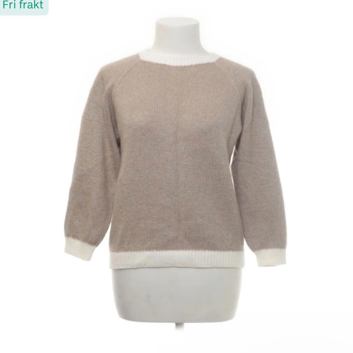 Beige stickad tröja med vita detaljer