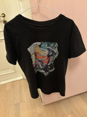 T shirt Converse All Star - Size M 100% cotton Worn quite a few times (see picture of the print)