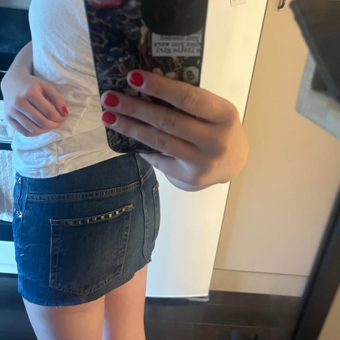 Mörkblå jeanskjol med nitar - 1