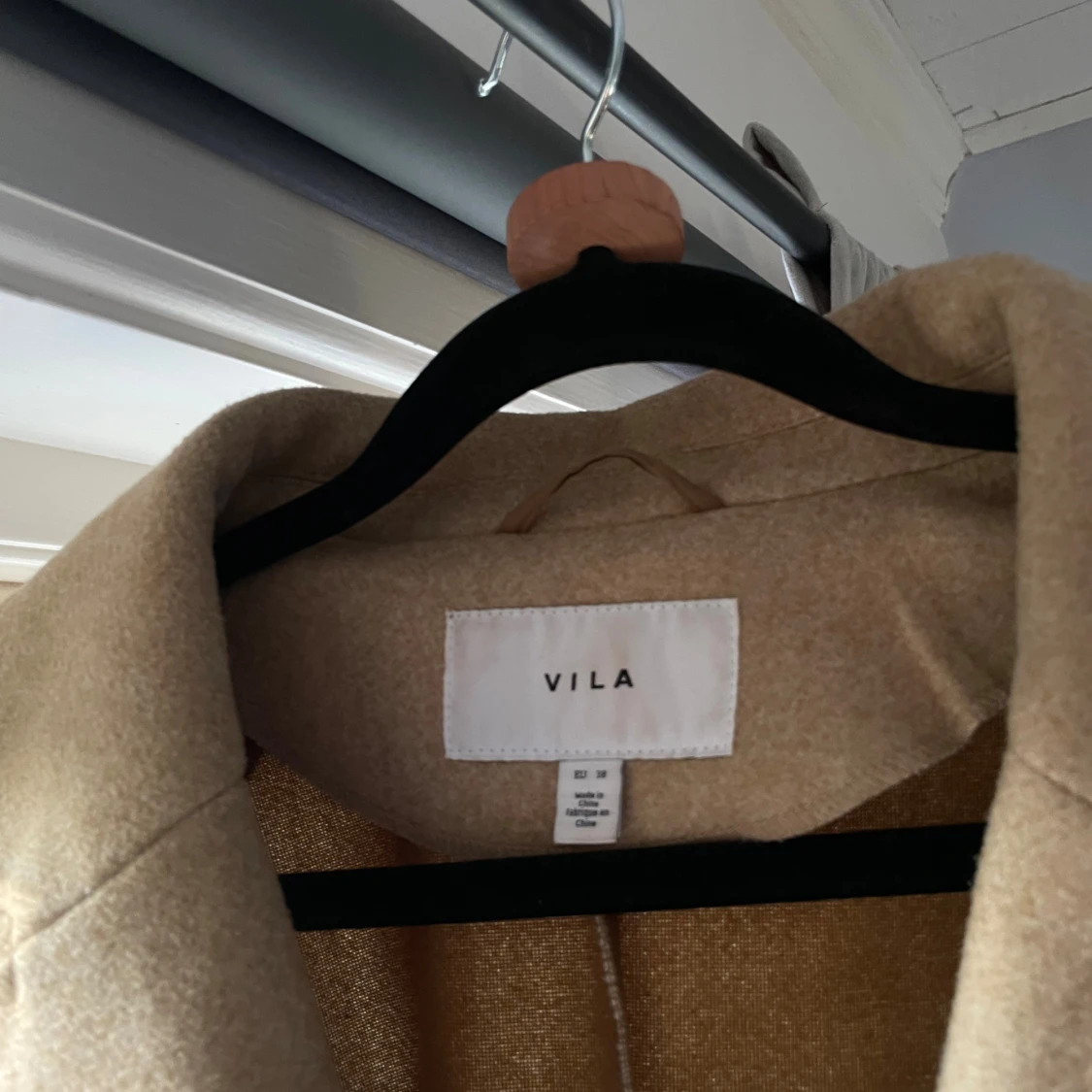 Beige kappa  från Vila - 2