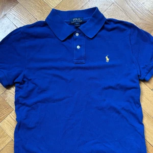 Polo pike - Polo ralph lauren|pike|fint skick|inga defekter|ljusblå|storlek 14-16 år