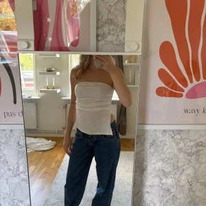 Tubtopp - En asymmetrisk tubtopp med en liten slits