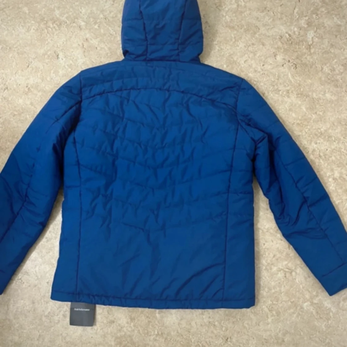 Blå pufferjacka Peak Performance - 1