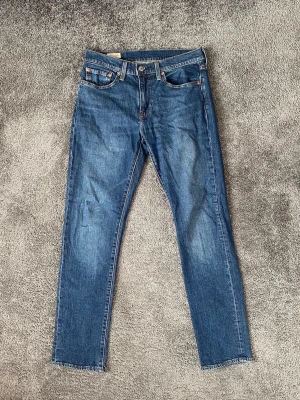 Blå 511 Levi's jeans - W31/L32 nästan oanvända 