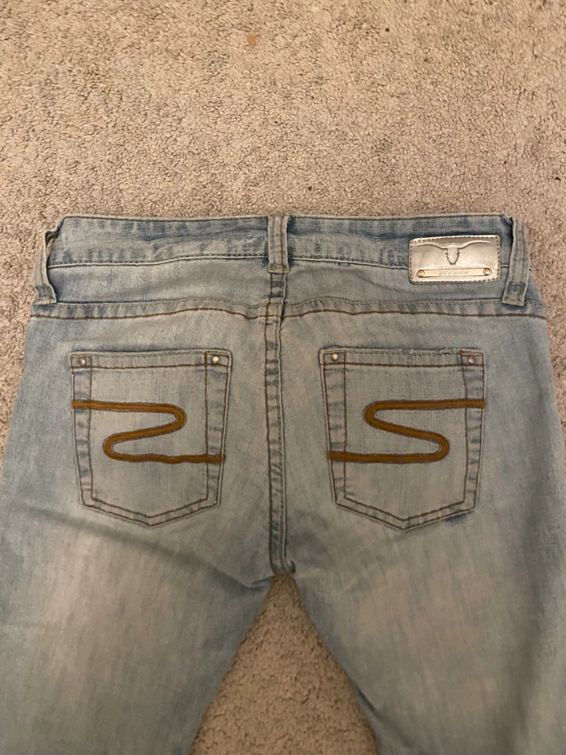 Ljusblå lågmidjade bootcut jeans  - 1