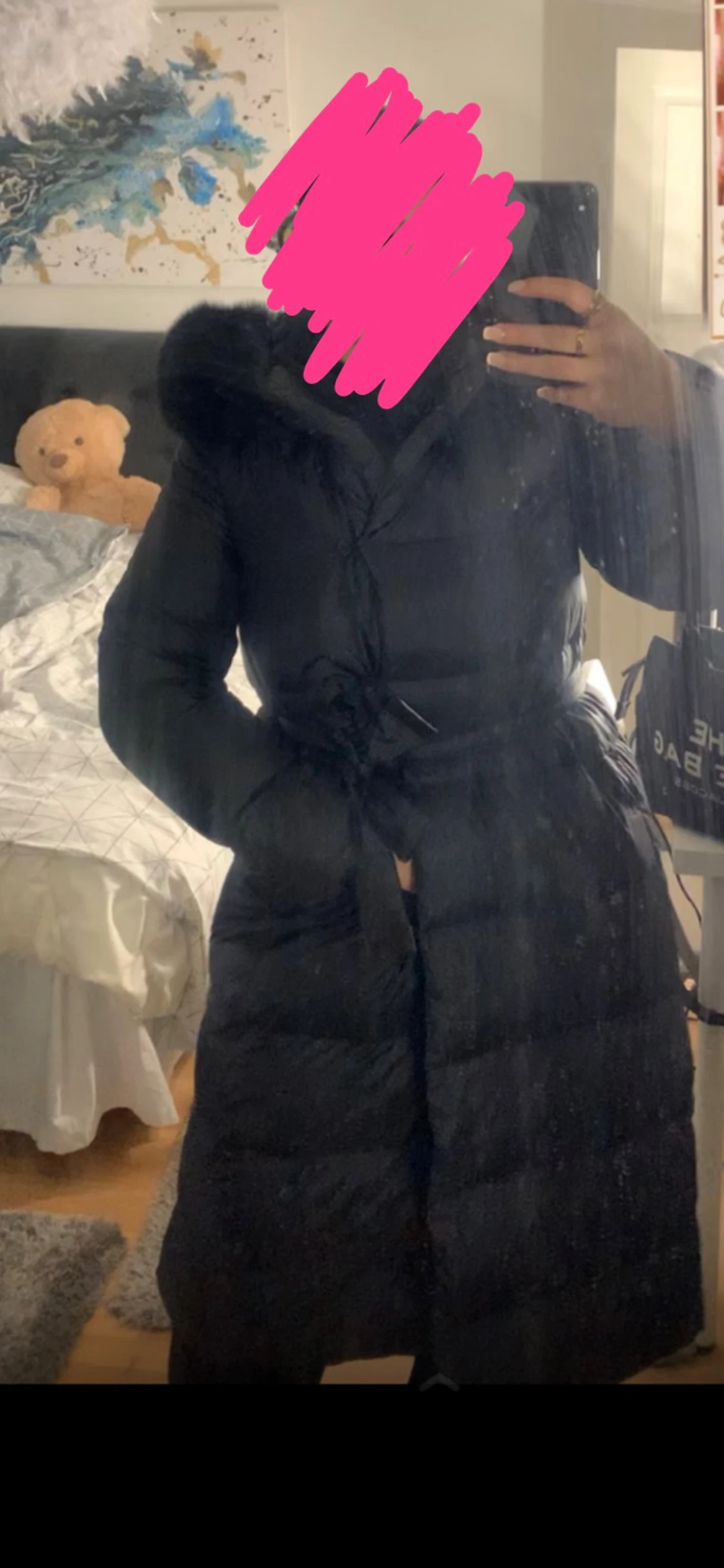 Svart jacka med pälskrage