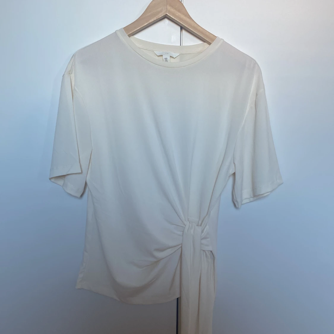 Beige knytblus från H&M