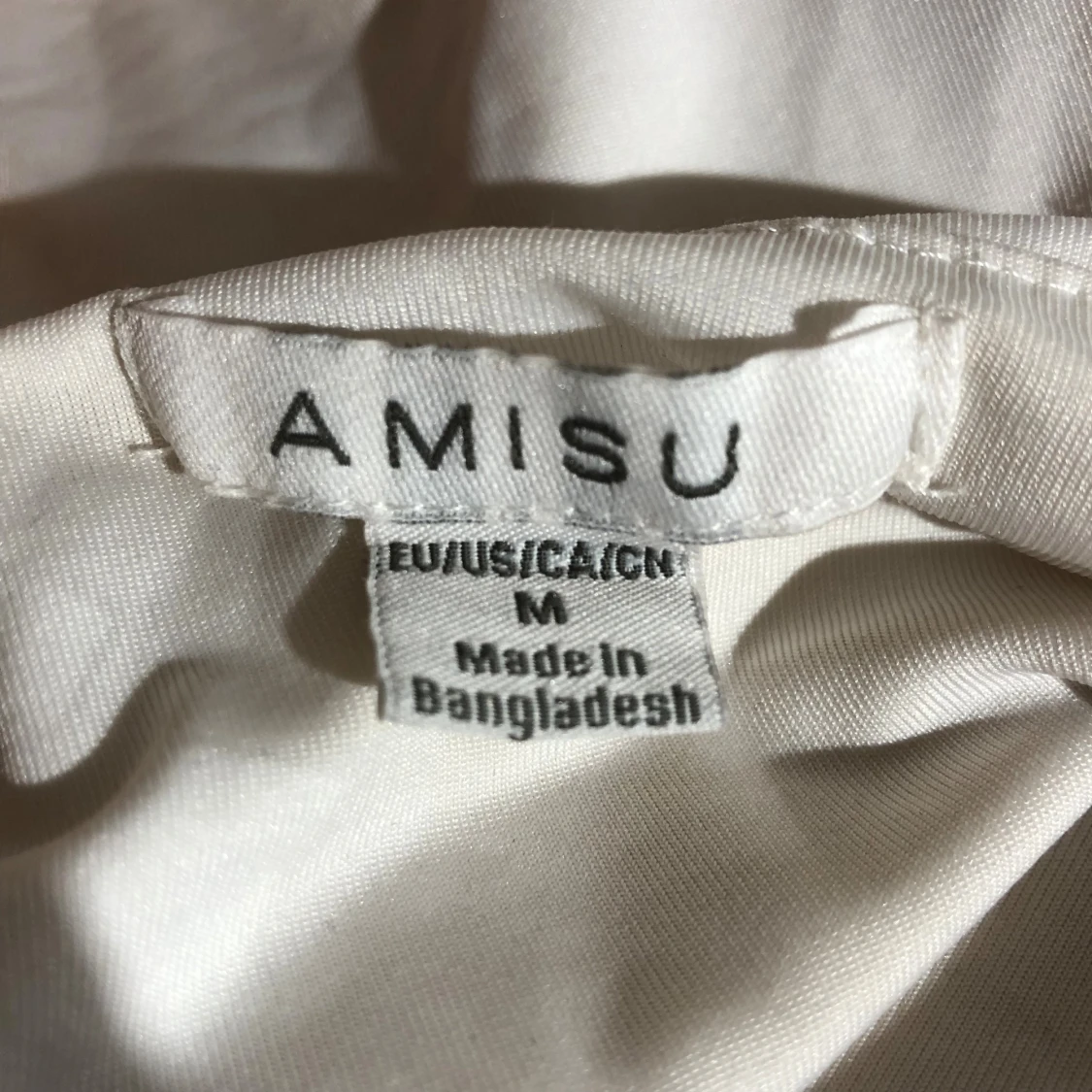 Vit linnetopp från Amisu - 2