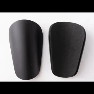 Benskydd - Svarta eller vita benskydd - storlek XS eller S