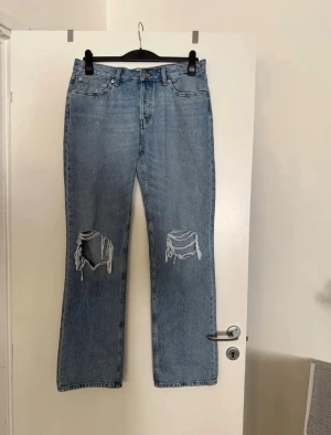 Jeans  - Storlek L. Aldrig använda. 