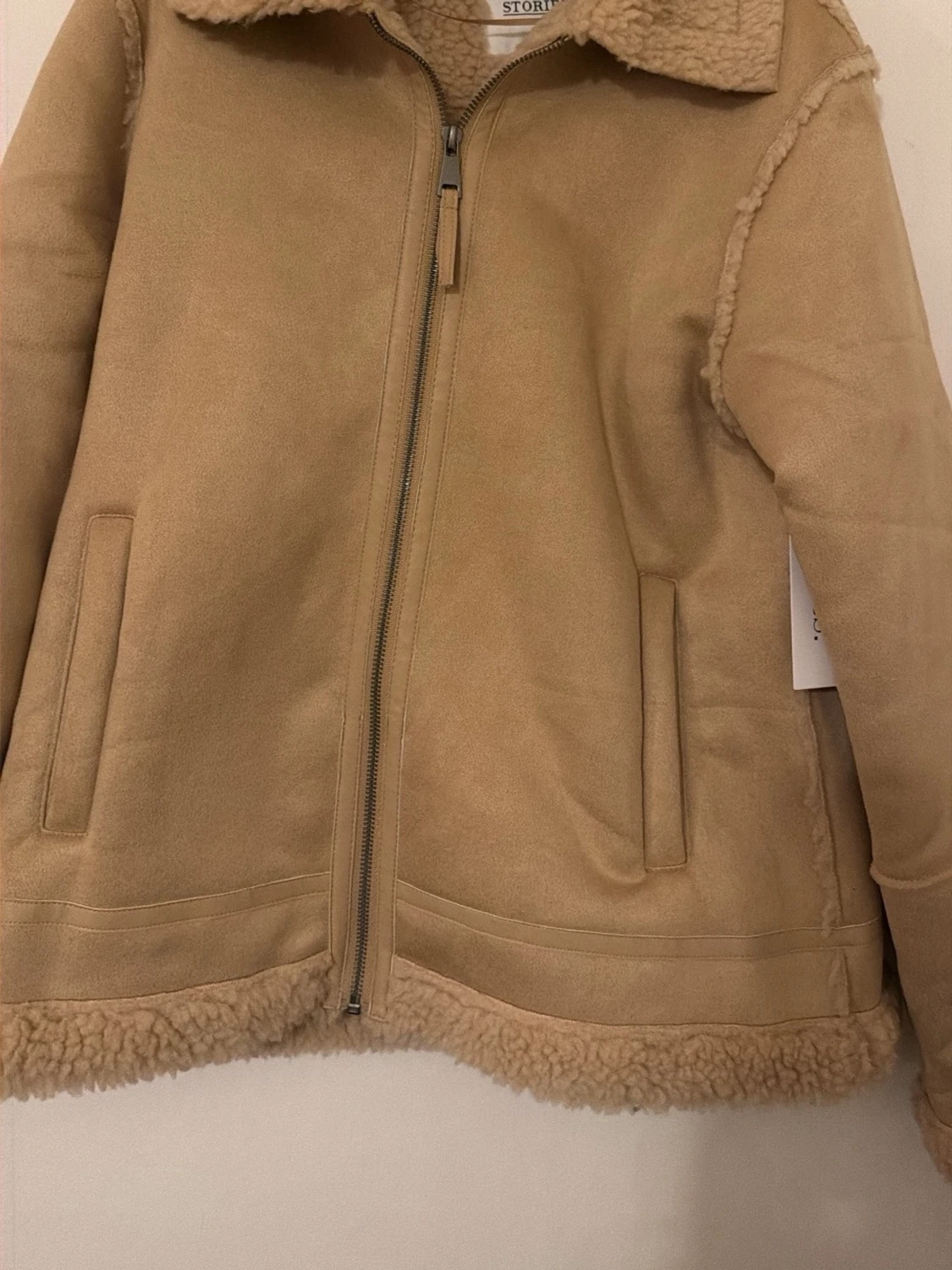 Beige pälsjacka från Storlek S