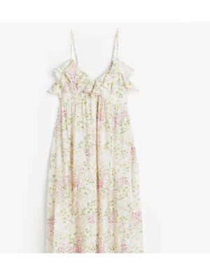 Blommig sommarklänning från H&M - Söt blommig klänning från H&M i ljusa toner med volangdetaljer vid axlarna och smala axelband🥰🥰👏