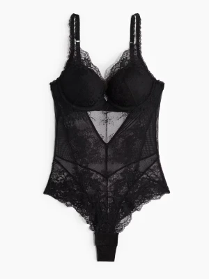 Svart spetsbody med push up  - Helt ny slutsåld spetsbody från hm. Köpte tyvär fel storlek därav säljer jag den. Den är i storlek 75A och är med push up. Somsagt helt ny med lapparna på.