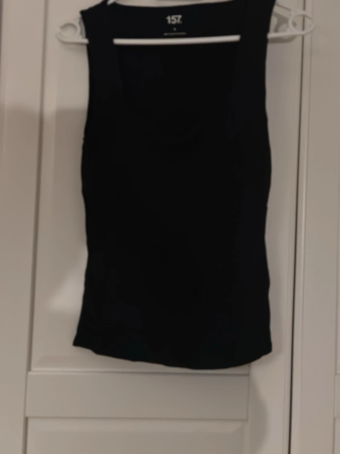 Svart linnetopp från 157