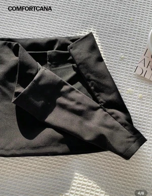 Mini kjol  - Mini kjol med inbyggda shorts 