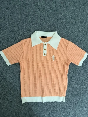 Amiri apricot polo shirt - Size M. New