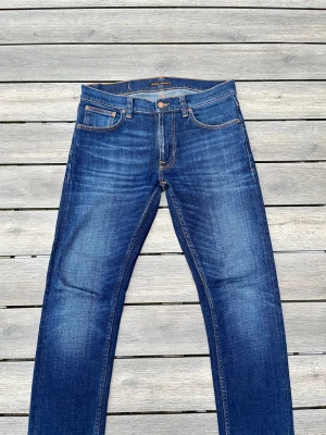 Nudie Jeans - Nudie jeans med en riktigt fet fade! Fint skick, inga defekter. Modellen heter lean dean. Storlek 30/30. Kontakta mig för fler frågor och funderingar!