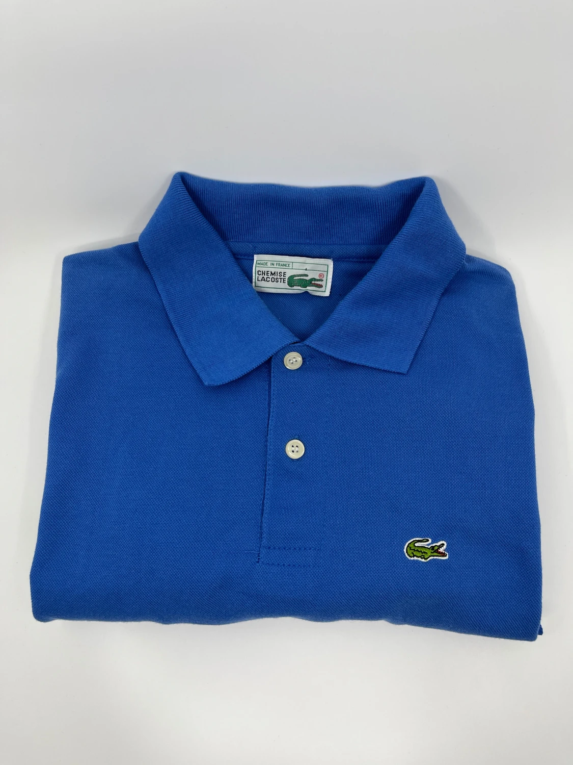 Blå polotopp från Lacoste - 1