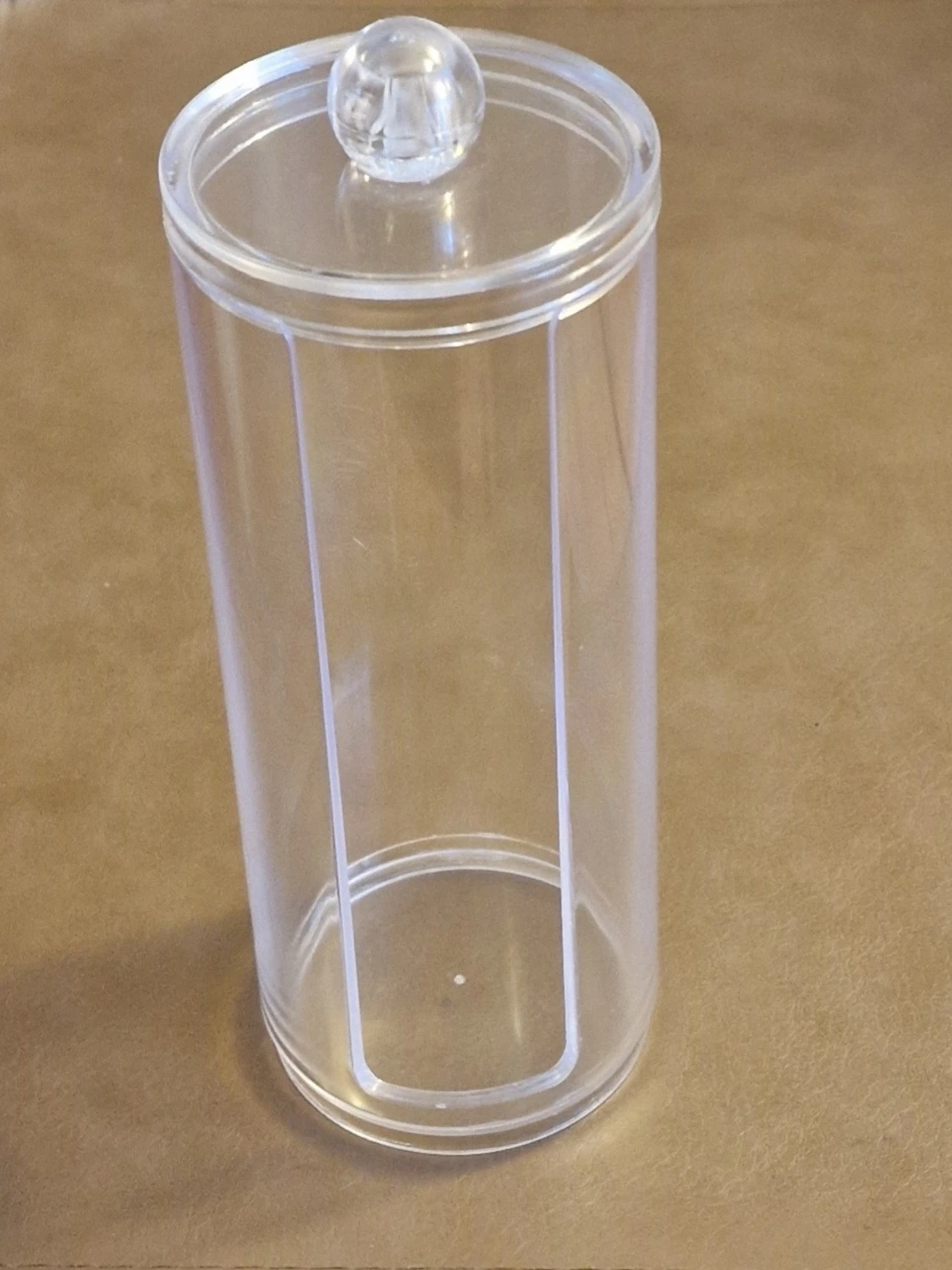 Genomskinlig behållare för bomullsrondeller