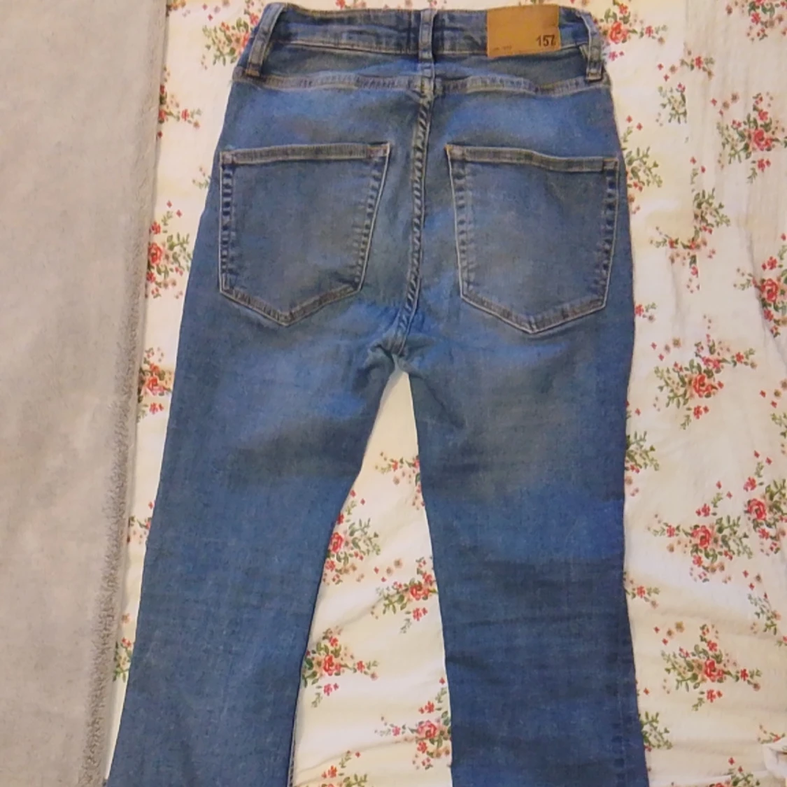 Blå bootcut jeans från 157 - 3