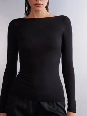 Svart långärmad topp Intimissimi  - Säljer denna populära genomskinliga toppen från Intimissimi. Storlek M. Säljer då den är för stor för mig. Använd några enstaka gånger och lite nopprig, men annars gott skick! 