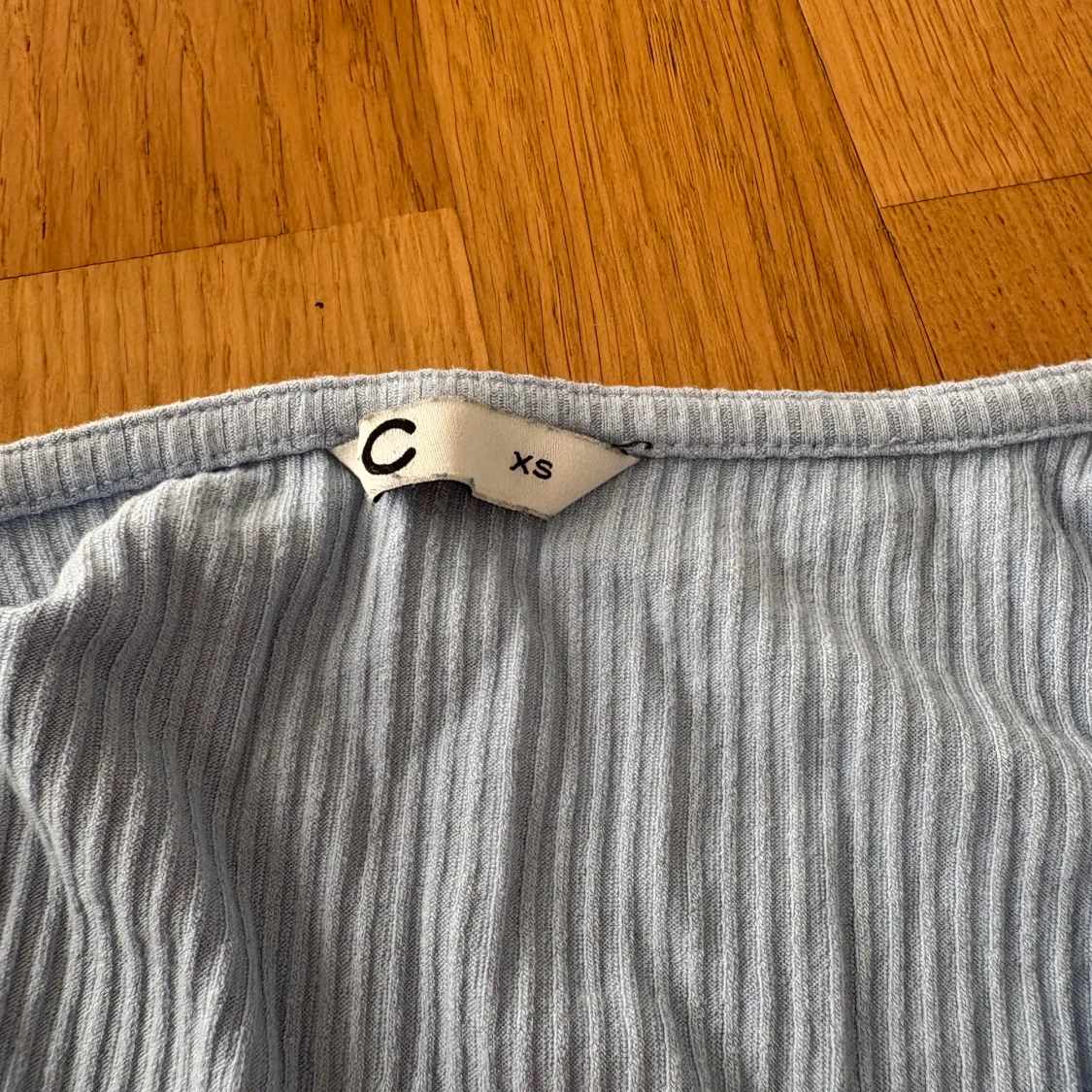 Ljusblå ribbad omlottröja XS - 1