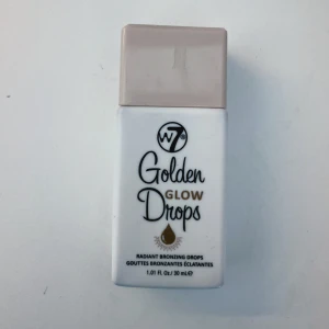Bronzing drops - Golden Glow Drops från W7 är flytande bronzer i en smidig vit plastflaska med beige lock. Sparsamt använd 💕