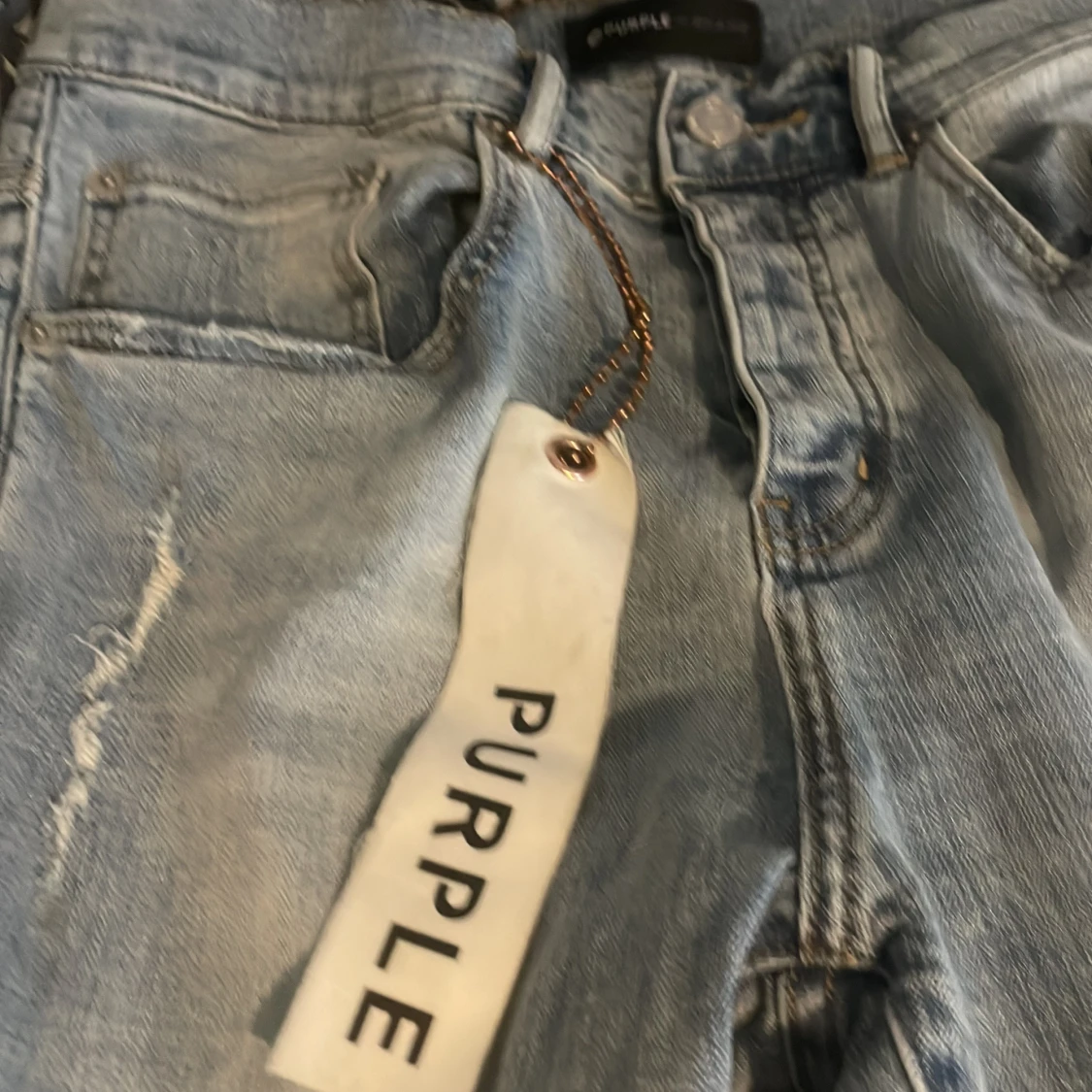 Ljusblå ripped jeans från Purple Brand - 1