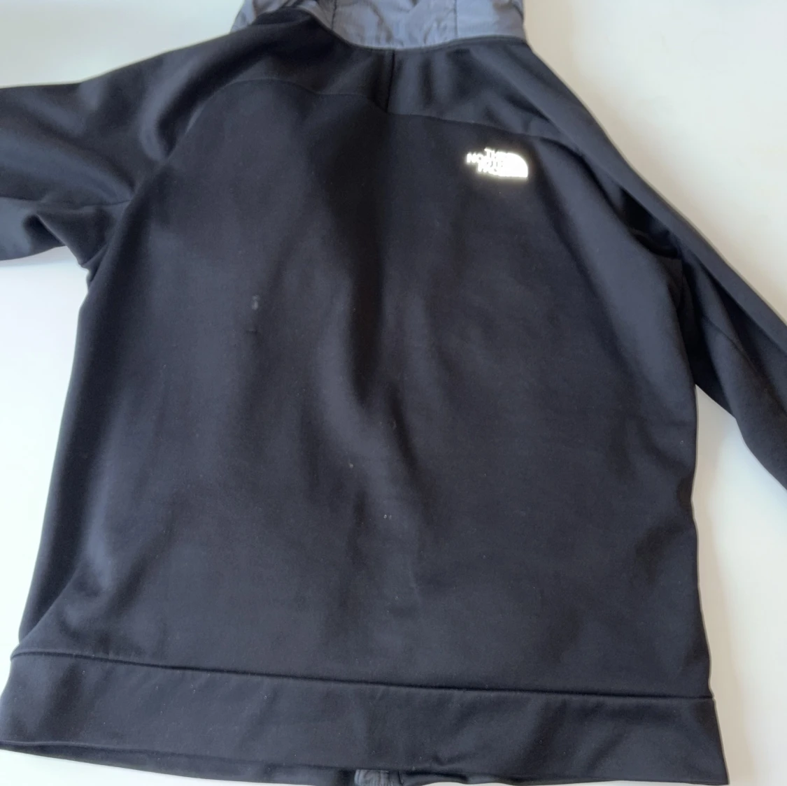 Svart och grå pufferjacka från The North Face - 3