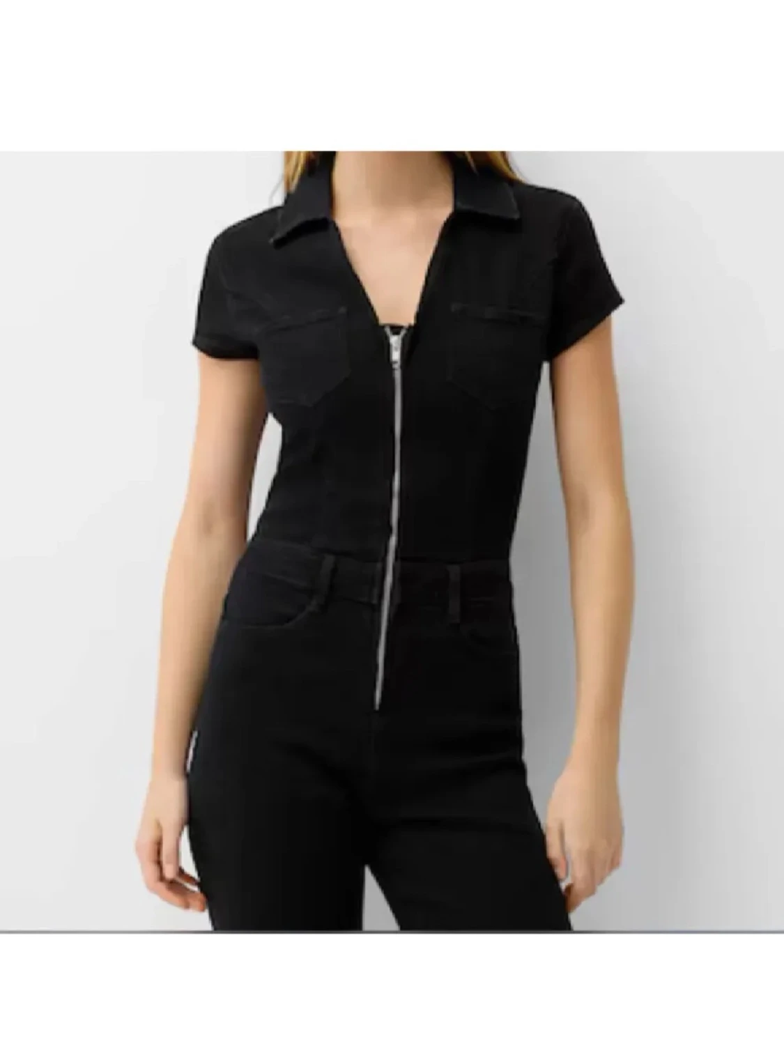 Svart jumpsuit med dragkedja