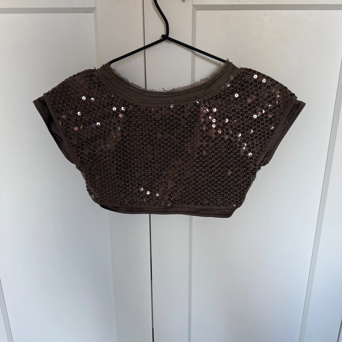 Brun bolerotopp med paljetter Reserved - 1