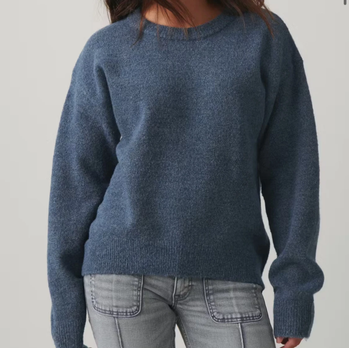 Blå stickad tröja