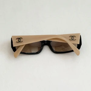 Chanel Super Rare Vintage Sunglasses - These super rare, vintage and highly coveted sunglasses from Chanel, crafted under Karl Lagerfeld's creative vision in the early 2000s, truly epitomize chic sophistication.  As seen on Bella Hadid in a different colourway.  Made in Italy.  Model 5078.  A few very minor scratches on the lenses from age, they’re not visible and not noticeable when wearing the sunglasses. 