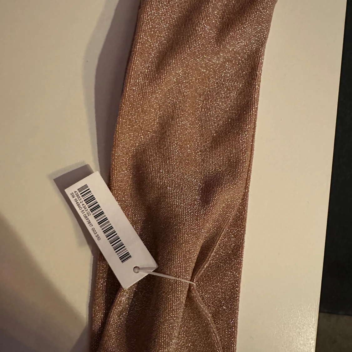 Glittrigt champagnefärgat pannband NY!