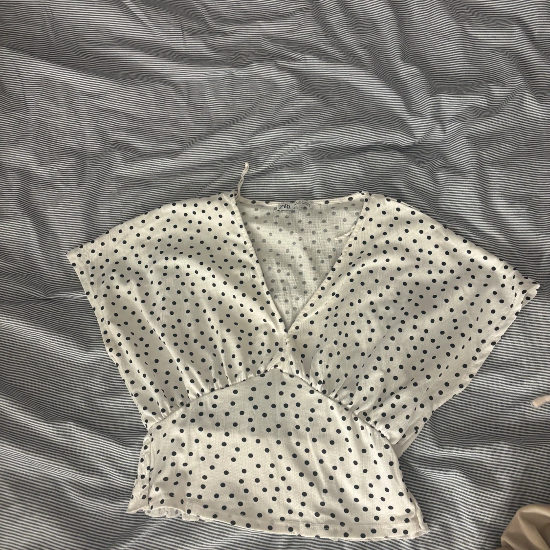 Prickig omlottopp från Zara