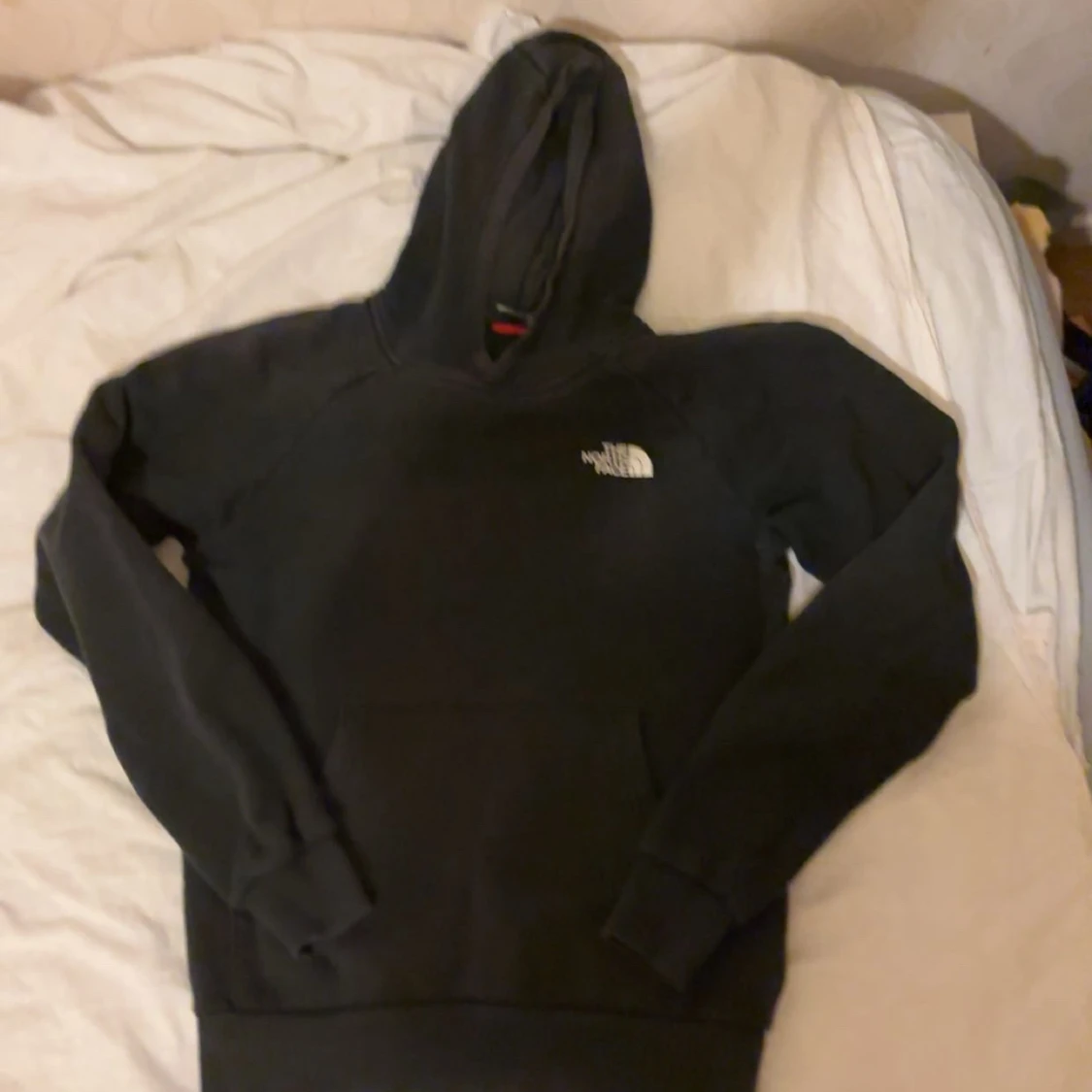 Svart hoodie från The North Face