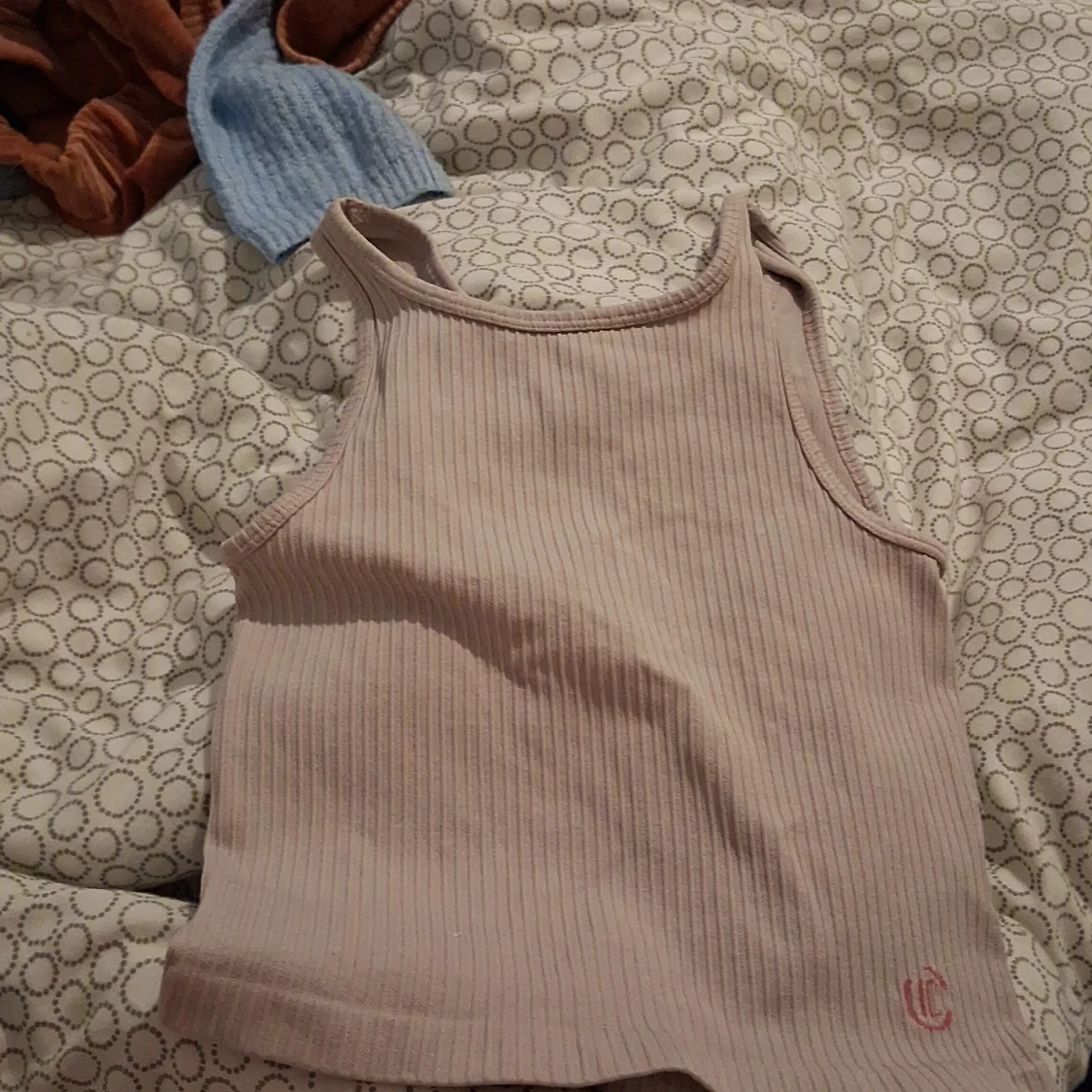 Ljusrosa ribbad linnetopp Iconic - 1