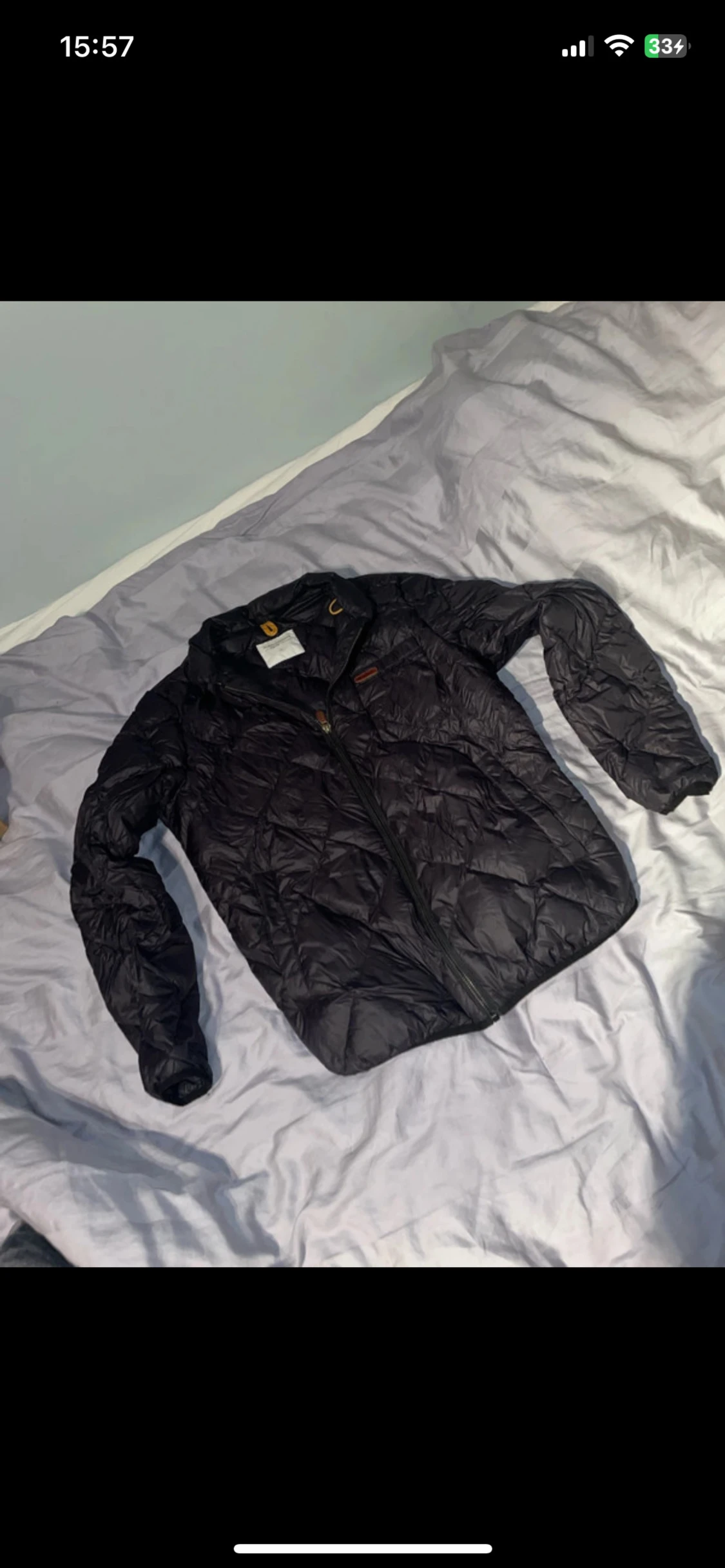 Svart quiltad dunjacka Peak Performance