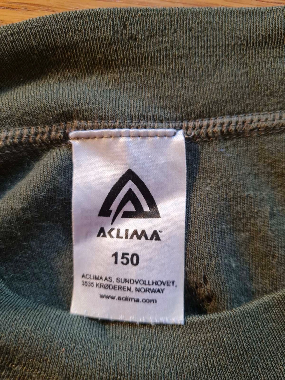 Mörkgrön långärmad tröja från Aclima strl 150 (barn) - 2