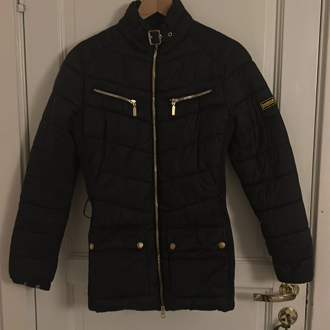 Svart quiltad pufferjacka Barbour