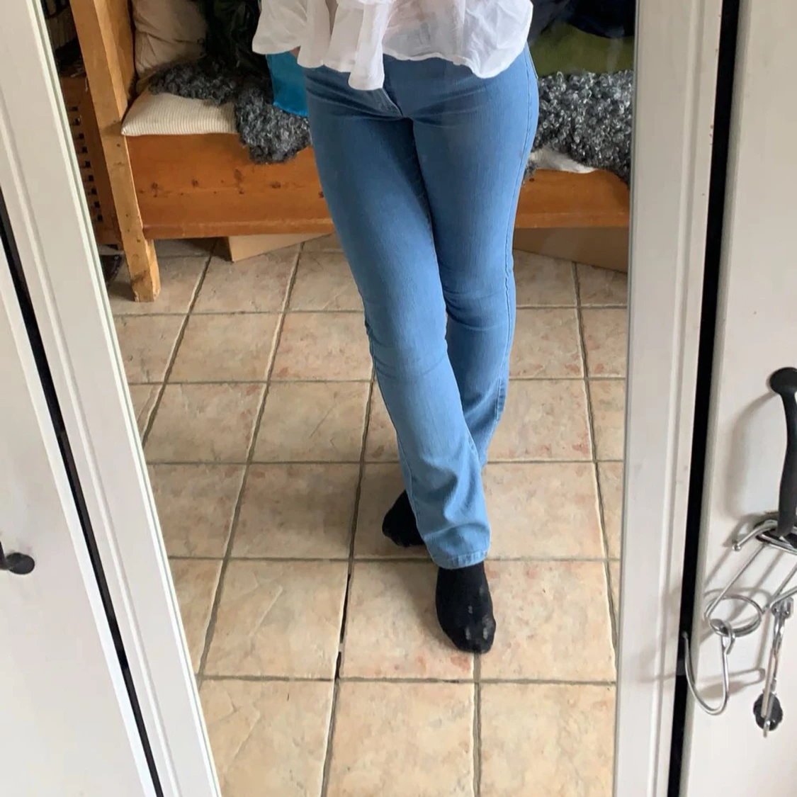 Ljusblå bootcut jeans