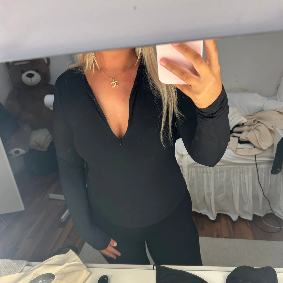 Svart långärmad tröja med half zip