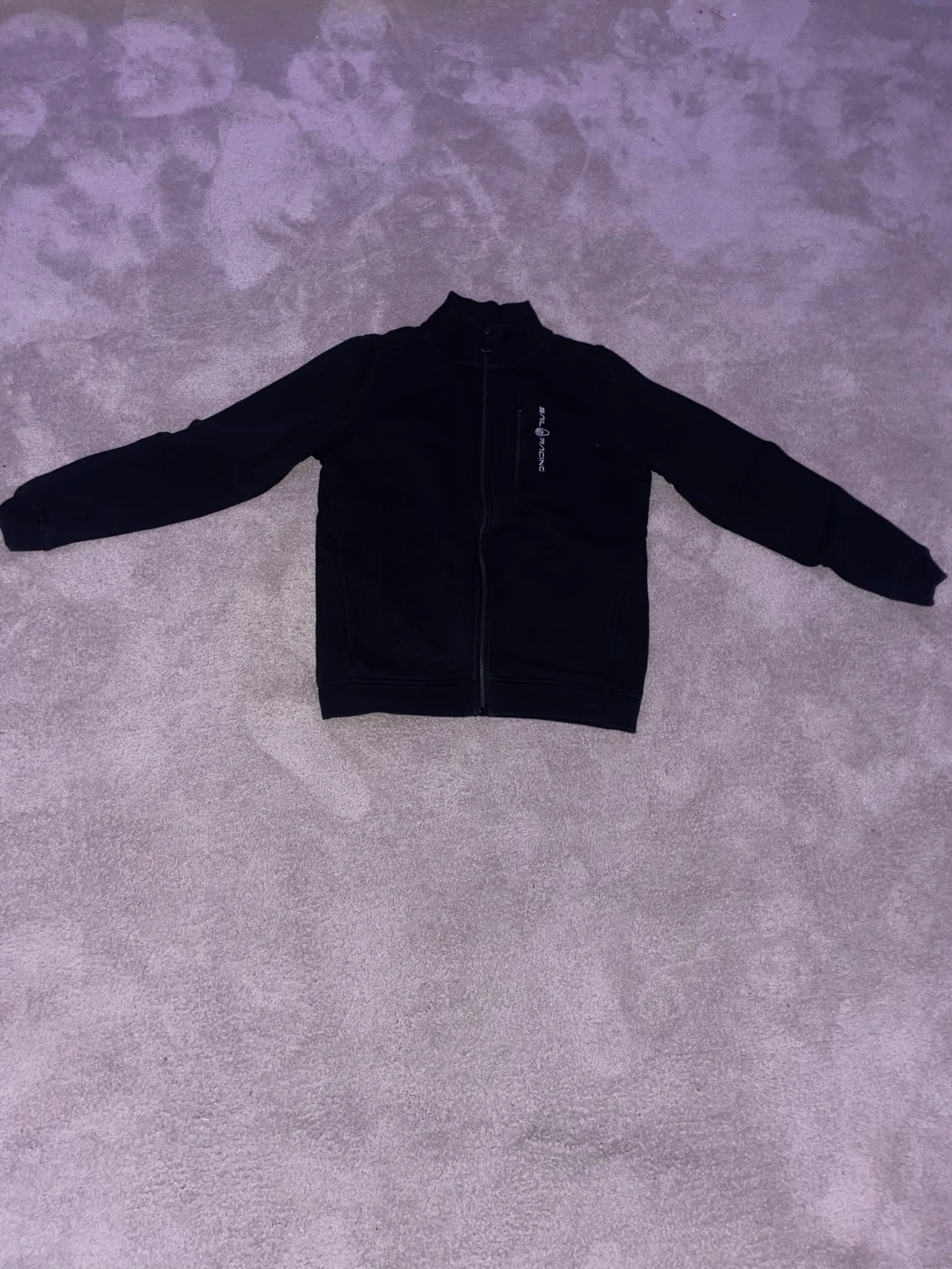 Svart fleecejacka från Sail Racing