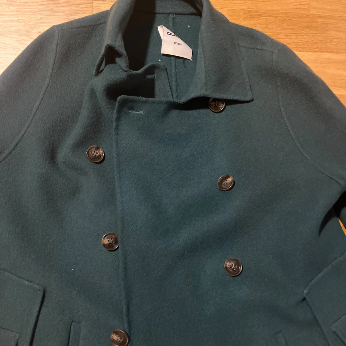 Mörkgrön skepparkappa från Oudifu - 1