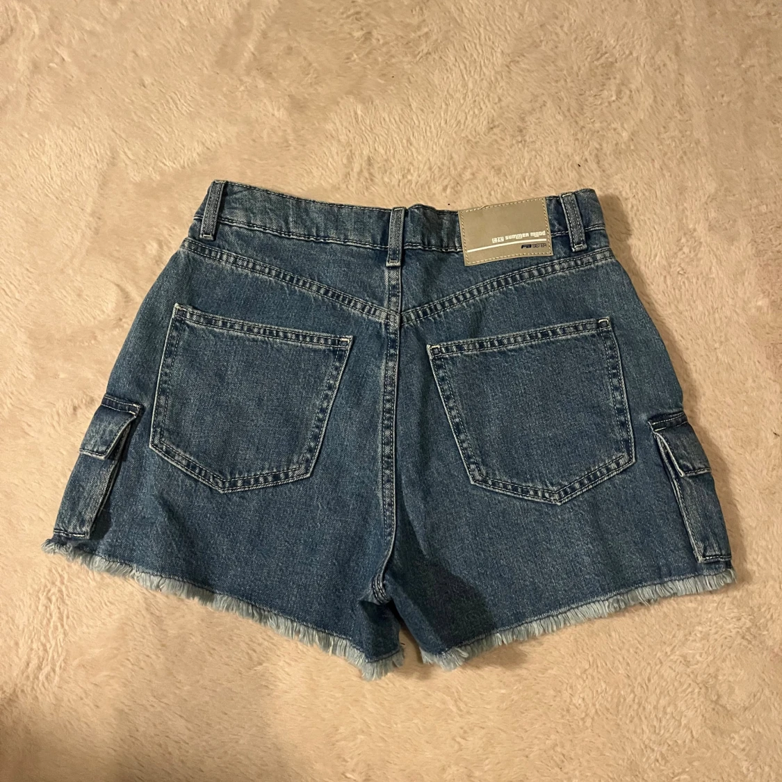 Blå jeansshorts med cargofickor  - 1