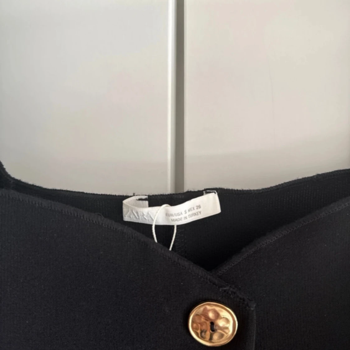 linne med guldknappar - 2