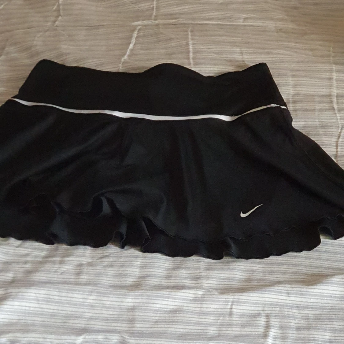 En åkta Nike basketball kjol med short