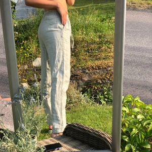 Linne byxor H&M 34 - Ljus natur grön färg, helt oanvända med lapp kvar 