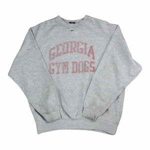 Vintage Nike Sweatshirt - Vintage Nike College Sweatshirt. Size: Medium. Bra vintageskick.