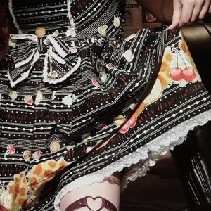 Sweet Lolita bodyline  - PAXAD Maple sugar waffle från bodyline. Nyskick utom att rosetten i midjan har lossnat, är lätt fastlimmad igen. Storlek S/M (smått liten på mig som har 38/40 men funkar fortfarande) hund finns i hemmet 